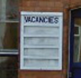 The empty Vacancies noticeboard that used to be on the door of Manchester Hosiery's factory when it was still running